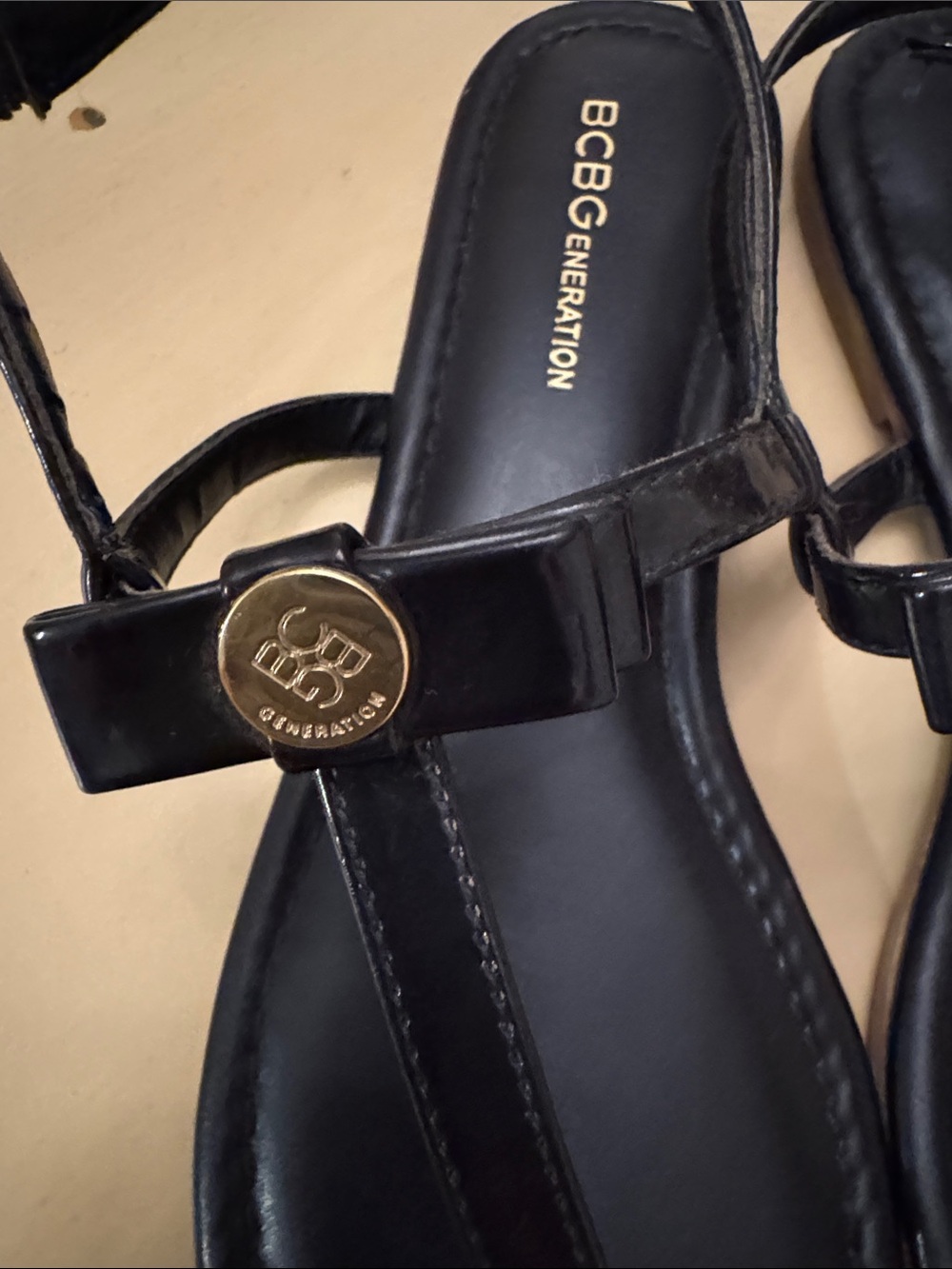BCBGeneration Navy Blue Patent T-Strap Sandals with Gold Medallion - Picture 6 of 8